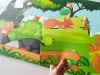 Puzzle cięte z folii magnetycznej z nadrukiem, format 80 x 60 cm - Wzór graficzny. Przedstawia leśne zwierzęta w zielonym