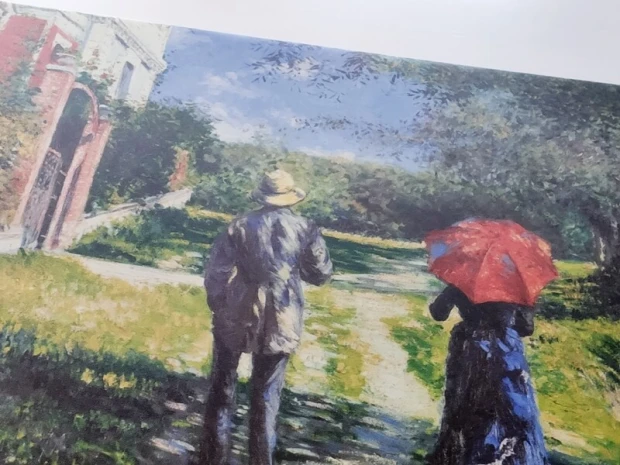 Reprodukcja Chemin montant, Gustave Caillebotte - Wzór graficzny. Dwie postacie idące ścieżką, jedna z parasolką, druga