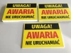 Tabliczka Uwaga awaria, nie uruchamiać - Wzór graficzny. Żółte tło z dużymi, czerwonymi literami na czarnym pasku