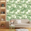 Tapeta na ścianę Liście monstery 0195 - Aranżacja w salonie. Ściany w jasnym kolorze, meble w odcieniach beżu i zieleni