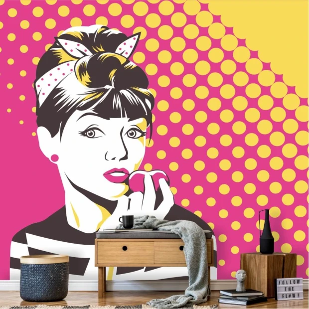 Tapeta Twarz kobieca w stylu pop-art 0305 - Wzór graficzny. Kobieta z kokiem trzymająca różowy owoc, tło w kropki