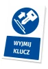 Tabliczka BHP z piktogramem Wyjmij klucz - Wzór graficzny. Okrągły piktogram z kluczem i strzałką na niebieskim tle. Tekst