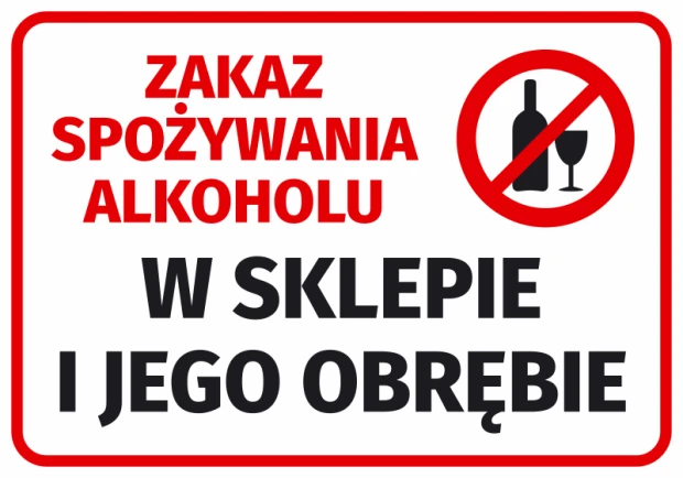 Naklejka BHP z czerwonym znakiem zakazu spożywania alkoholu oraz czytelnym napisem ostrzegawczym na białym tle