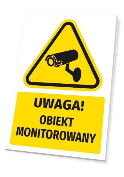 Żółto-biała tabliczka ostrzegawcza BHP z czarnym piktogramem kamery i napisem Uwaga! Obiekt monitorowany