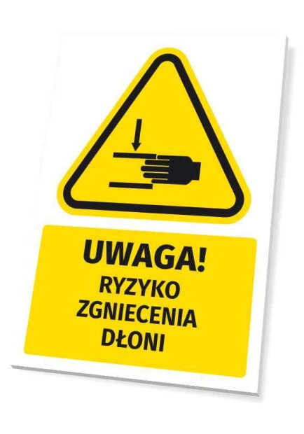 Żółta tabliczka ostrzegawcza BHP z czarnym piktogramem i napisem UWAGA! RYZYKO ZGNIECENIA DŁONI na białym tle