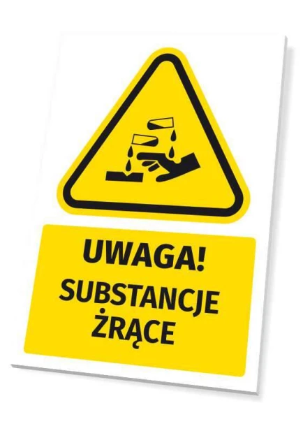 Żółta tabliczka ostrzegawcza BHP z czarnym piktogramem i napisem Uwaga! Substancje żrące na białym tle
