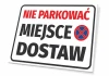 Tabliczka Nie parkować Miejsce dostaw - Wzór graficzny. Czerwony tekst na białym tle, symbol zakazu parkowania