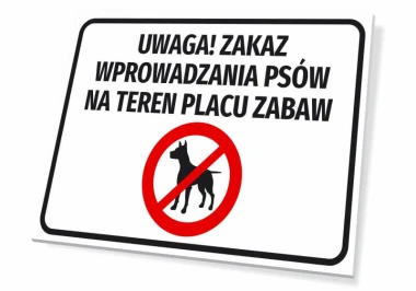 Tabliczka Uwaga! Zakaz wprowadzania psów na teren placu zabaw - Wzór graficzny. Prostokąt z białym tłem, czarny napis