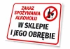 Tabliczka Zakaz spożywania alkoholu w sklepie i jego obrębie - Wzór graficzny. Czerwony okrąg z przekreśloną butelką