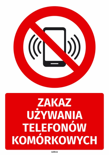 Naklejka BHP z czerwonym znakiem zakazu używania telefonów komórkowych i białym napisem na czerwonym tle