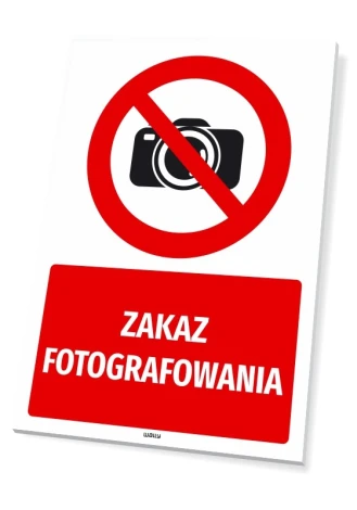 Tabliczka BHP Zakaz fotografowania - Wzór graficzny. Czerwony okrąg z przekreśloną kamerą na białym tle. Czerwony prostokąt