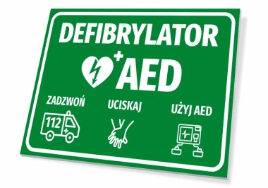Tabliczka Defibrylator AED z piktogramami pomocy - Wzór graficzny. Zielone tło z białymi napisami i ikonami