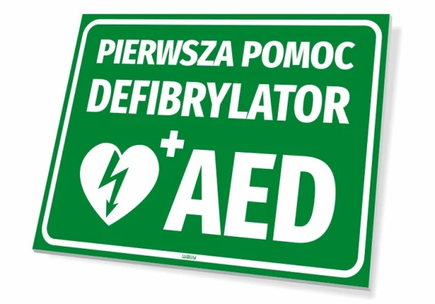 Zielona tabliczka BHP Pierwsza pomoc Defibrylator AED z białym piktogramem serca z błyskawicą na białym tle