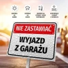 Tabliczka Nie zastawiać, wyjazd z garażu - Wzór graficzny. Czerwony napis na białym tle z kroplami wody