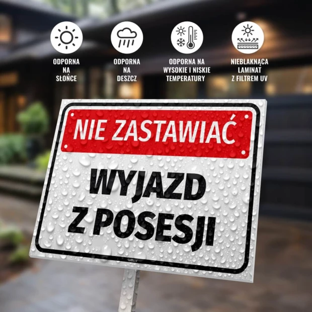 Tabliczka Nie zastawiać, wyjazd z posesji - Wzór graficzny. Prostokątna tabliczka z dużymi literami, w kolorze białym