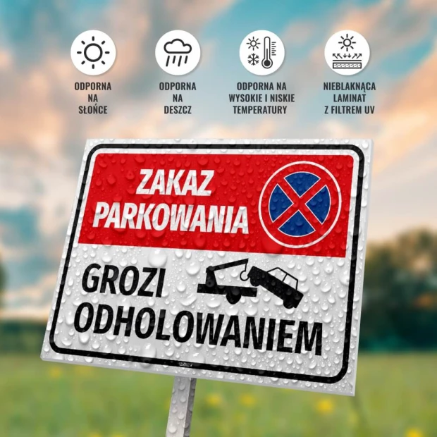 Tabliczka Zakaz parkowania grozi odholowaniem na słupku, z ikonami odporności na słońce, deszcz i temperaturę