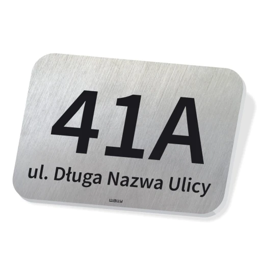 Tabliczka adresowa na białym tle z przykładowym polem na numer domu oraz ulicę i skrótem ul