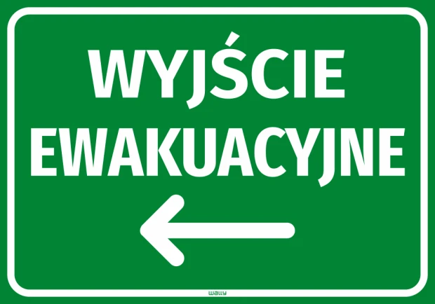 Zielona naklejka BHP z białym napisem Wyjście ewakuacyjne i strzałką w lewo, przedstawiona na białym tle