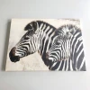 Obraz na płótnie ze zdjęcia 75x100 cm - Wzór graficzny. Dwa zebry z wyraźnymi czarno-białymi paskami