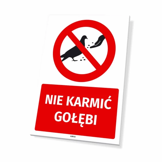 Tabliczka zakazu z napisem Nie karmić gołębi oraz czerwonym piktogramem przekreślonego ptaka na białym tle