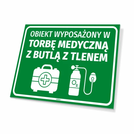 Tabliczka Obiekt wyposażony w torbę medyczną z butlą z tlenem - Wzór graficzny. Zielone tło z białym tekstem i ikonami torby