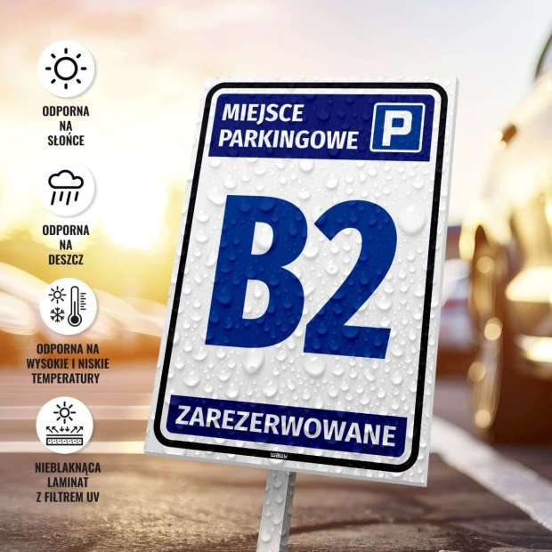 Tabliczka Miejsce parkingowe, zarezerwowane, z oznaczeniem, numerem - Wzór graficzny. Na białym tle niebieskie napisy