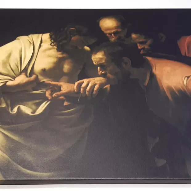 Obraz na płótnie z reprodukcją dzieła Caravaggia pod tytułem Niewierny Tomasz ukazujący biblijną scenę
