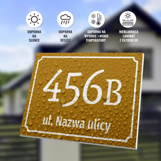 Złota tabliczka adresowa z kroplami wody w infografice pokazującej odporność na warunki atmosferyczne