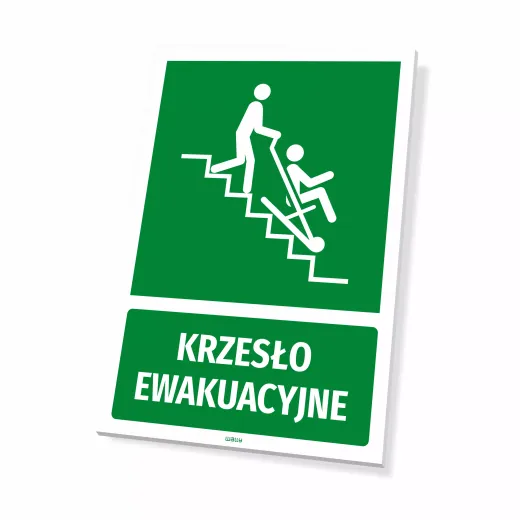 Zielona tabliczka ewakuacyjna BHP z białym piktogramem i napisem Krzesło ewakuacyjne, pokazana na białym tle