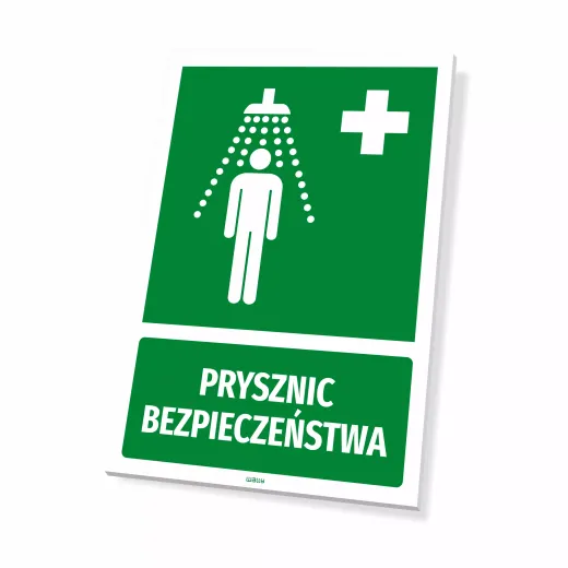 Zielona tabliczka BHP z piktogramem pierwszej pomocy i białym napisem Prysznic bezpieczeństwa