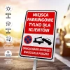 Tabliczka: Miejsca parkingowe tylko dla klientów Odholowanie na koszt właściciela pojazdu