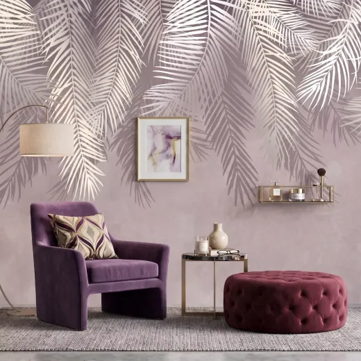 Fototapeta z nadrukiem liści palm daktylowych na ścianie w salonie
