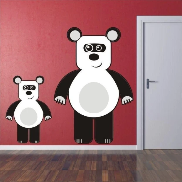 Urocza naklejka panda w nowoczesnym pokoju dziecięcym, dodająca radosnego akcentu na ścianie.